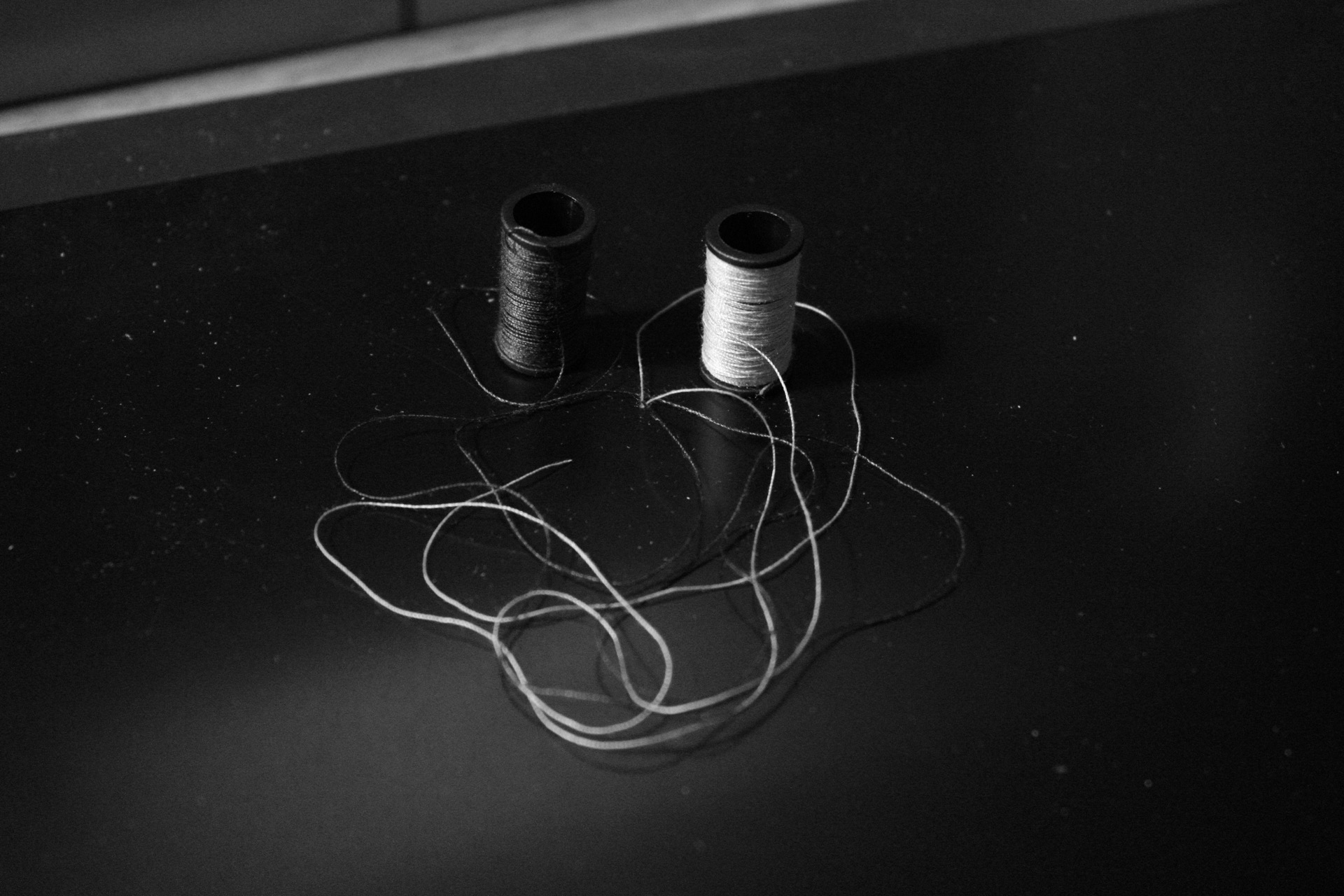 Picture 6: Two unraveled spools of thread